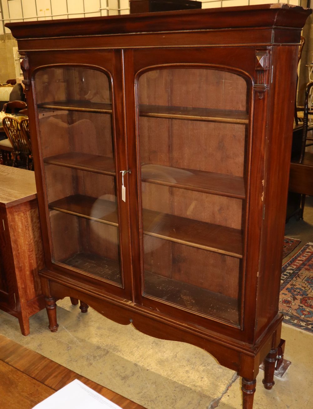 A Victorian mahogany bookcase cabinet on stand, W.158cm, D.34cm, H.175cm